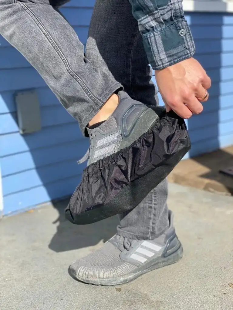 A person wearing a washable shoe cover
